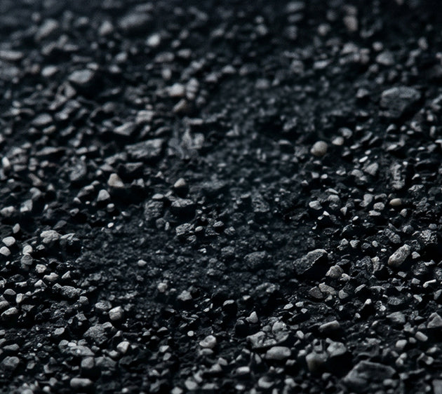 ZIFFERBLATT AUS DEM ASPHALT DER RENNSTRECKE